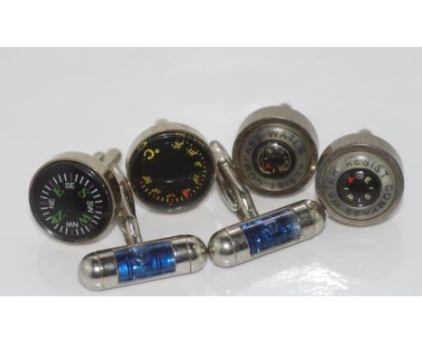 Three pairs 'tool' cufflinks including compass, spirit level, and compass/thermometer