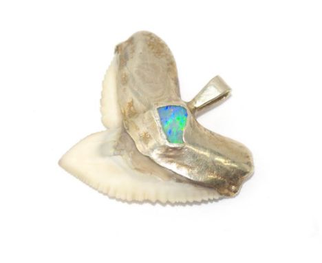 Opal and shark's tooth pendant set in silver gilt