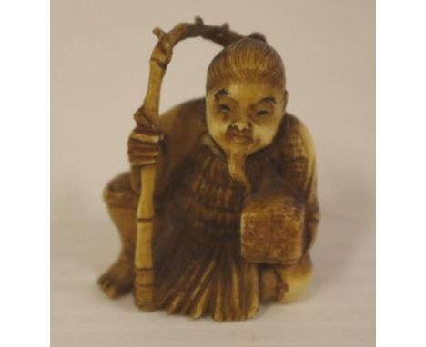Japanese antique carved ivory netsuke, C:1920 seated fishing gentleman, H4cm approx