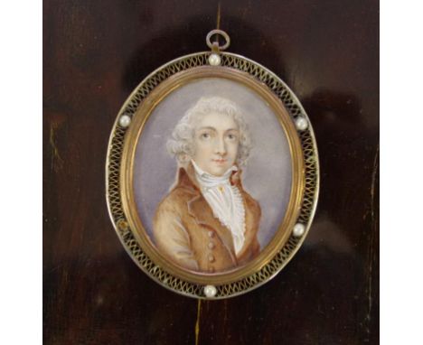 Antique portrait miniature of a gentleman in a oval filigree metal & seed pearl frame (one pearl missing) & with metal initia