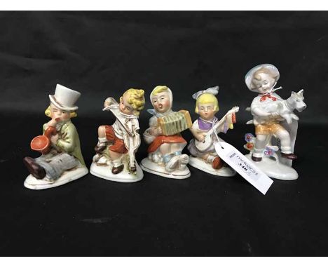 LOT OF CERAMIC FIGURES OF CHILDRENfive playing instruments, one with a dog, together with EPNS tea service with six similar g