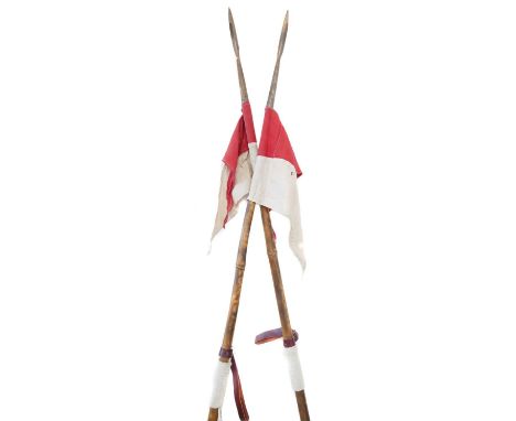 Pair of Indian lances, the steel points mounted on bamboo poles with string-bound grips and steel bases, early 20th century.W