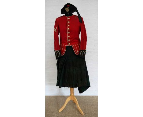 Glasgow Highlanders uniform, including a cap with 10th Glasgow Highlanders LRV badge, red tunic top and green kilt. The unifo