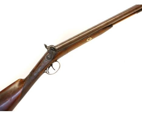 Percussion 14 bore side by side double barrel shotgun by Smith, 28inch Damascus barrels, scroll engraved actions and chequere
