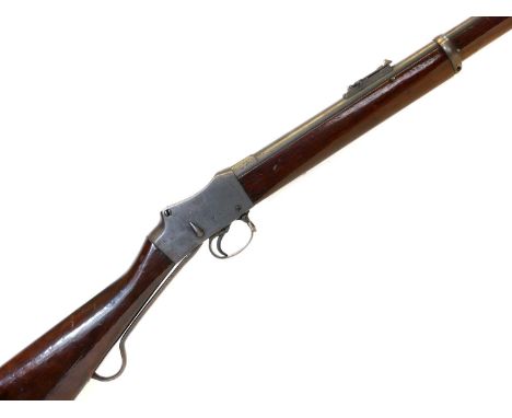 Enfield Martini Henry MkIV .577/450 rifle, 32inch barrel fitted with ladder rear sight and secured by two bands incorporating