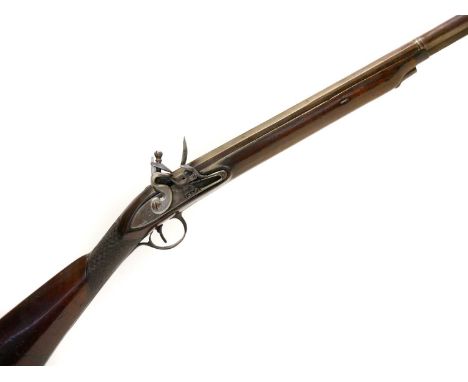 Flintlock 13 bore single barrel shotgun, originally a flintlock which has been converted to percussion and then back to flint