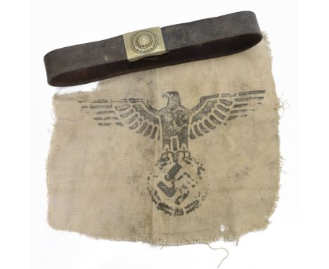 WWII German army die struck belt buckle 'Gott Mituns' with brown leather belt, together with piece of canvas from a german wa