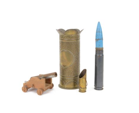 WWI trench art, comprising miniature coal scuttle, model of a cannon and vase with fluted rim, together with 1918 shell