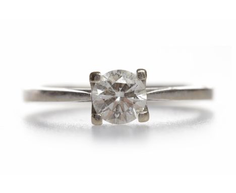 DIAMOND SOLITAIRE RINGthe round brilliant cut stone of approximately 0.51 carats on a tapered eighteen carat white gold shank