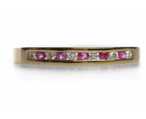 RUBY AND DIAMOND HALF ETERNITY RINGwith channel set round brilliant cut diamonds totalling approximately 0.06 carats interspa