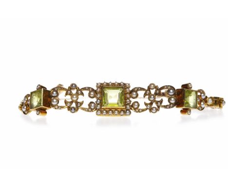 EDWARDIAN SEED PEARL AND PERIDOT BRACELETthe main decorative section formed by a central square step cut peridot 8.5mm across