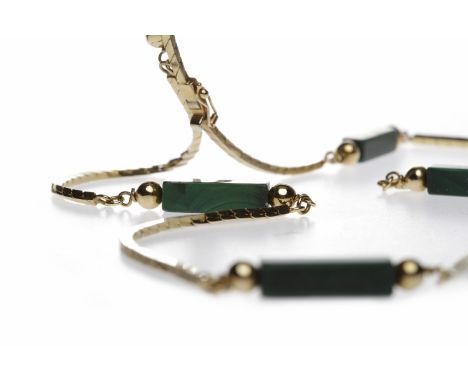 NINE CARAT GOLD MALACHITE NECKLACEwith rectangular sections of malachite 18mm long interspaced by sections of chain, 31.7g