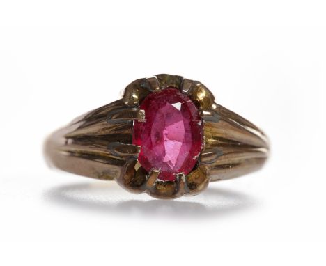 EDWARDIAN CREATED RUBY RINGset with a single oval created ruby 8.7mm long, in nine carat gold, full Chester hallmarks for 190