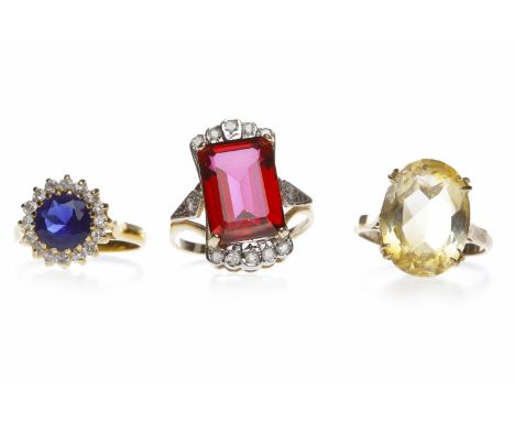 THREE VARIOUS NINE CARAT GOLD DRESS RINGSincluding an art deco style example, each set with coloured gems, size K, N and Q, 1