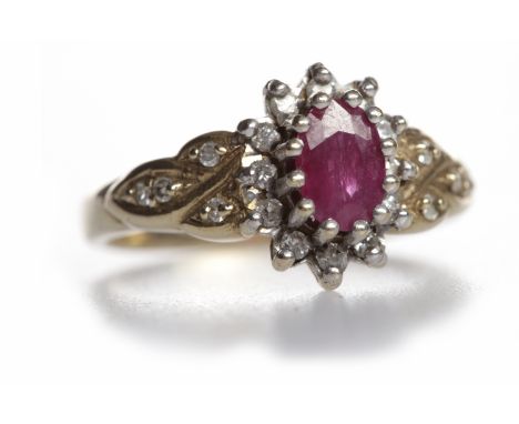 RUBY AND DIAMOND CLUSTER RINGthe central oval ruby approximately 0.32 carats surrounded by round brilliant cut diamonds, on d
