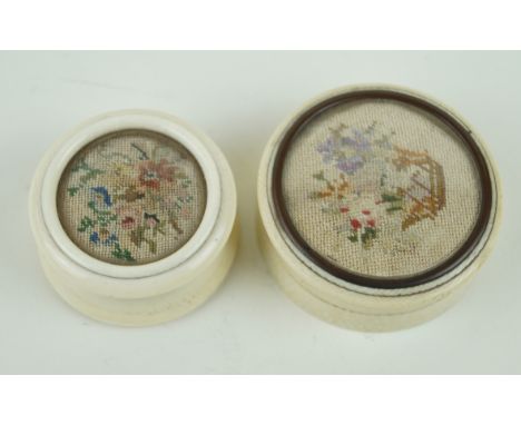 Two circular ivory patch boxesLate 19th/early 20th Century, each with tapestry tops having floral decoration, diameter of lar