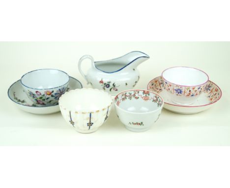Seven pieces of 18th and 19th Century porcelainTo include milk jug, two tea bowls and saucers, tea bowl each with hand-painte