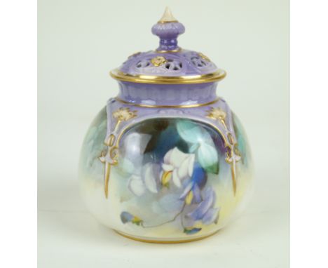 A Royal Worcester hand-painted pot pourri and coverDecorated with floral sprays with gilt and purple glazed motifs, green fac