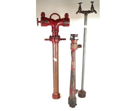 A collection of fire brigade equipment, mid 20th CenturyTo include stirrup pump, twin tap head, Mini Max fire extinguisher, b