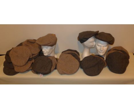 A collection of approx forty Harvey James flat capsVarying tweed colours from grey to light brown.