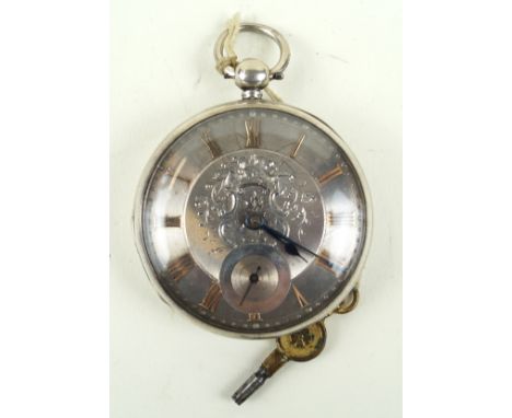 A Victorian hallmarked silver pocket watchHaving filigree central decoration, Roman numerals and subsidiary seconds dial, cas