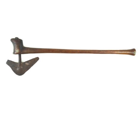 An African Zulu axe, late 19th/early 20th Century The arrow shaped axe mounted on a 49cm long wooden shaft. 