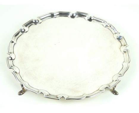 A George V hallmarked silver card tray With cast piecrust edge, makers marks indistinct, London 1923, approximate weight 19.1