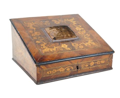 A Victorian inlaid mahogany sewing boxOf tapering form, with central pin cushion, having inlaid marquetry decoration, height 