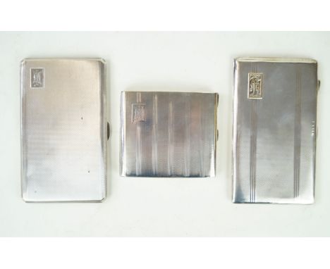 Three Art Deco hallmarked silver cigarette casesEach with engine turned decoration and rectangular panel with initials, to in