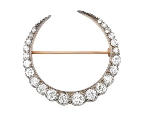 A Victorian Crescent Broochset throughout with old cut and eight-cut diamonds, in white collet settings, total estimated diam