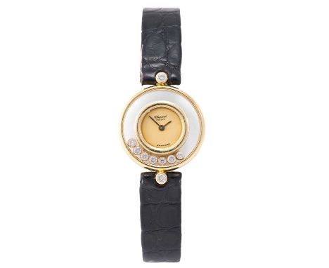 Chopard: A Lady's 18 Carat Gold Diamond Wristwatch, signed Chopard, model: Happy Diamonds, ref: 4112, circa 2000, quartz batt