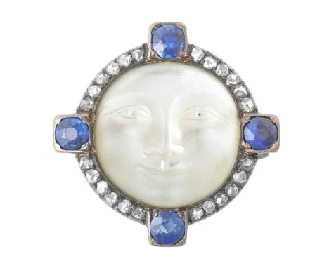 A Late 19th/Early 20th Century Moonstone, Sapphire and Diamond Brooch the round moonstone plaque carved to depict a face, wit