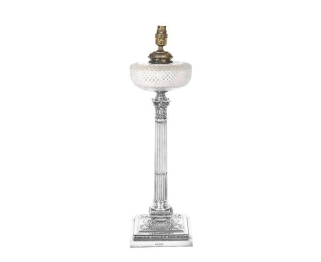 A Victorian Silver Oil-Lamp,  by James Dixon and Sons Ltd., Sheffield, 1896 on square base, chased with foliage and husk swag