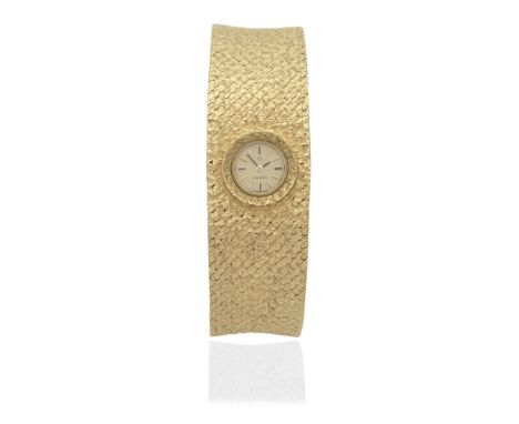 Omega. A lady's 18K gold manual wind bracelet watchReference: BA7115941Date: Purchased 9th April 1969Movement: Jewelled manua