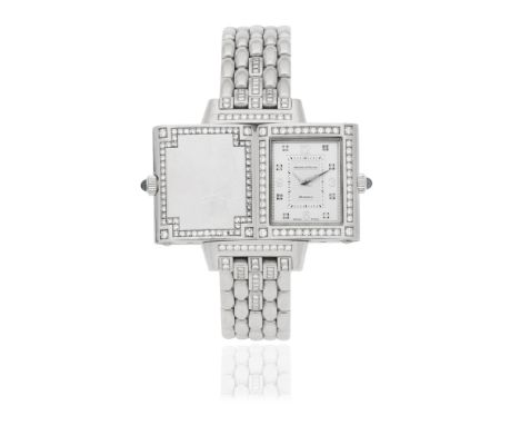 Jaeger-LeCoultre. A lady's 18K white gold diamond set quartz reversible bracelet watchModel: ReversoReference: 267.3.08Date: 