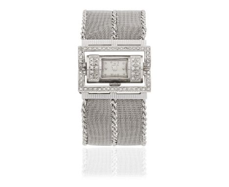 Invicta. An unusual lady's 18K white gold and diamond set manual wind bracelet watchDate: Circa 1960Movement: 19-jewel manual