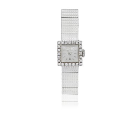 Patek Philippe. A lady's 18K white gold and diamond set manual wind bracelet watch with Gay Frères braceletReference: 3268/6D