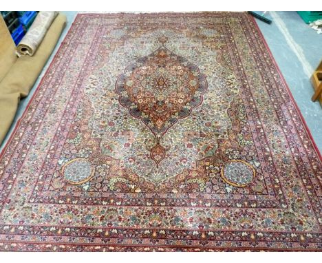 Modern machine woven Persian style carpet with central medallion on floral ground. 360cm x 275cm. 