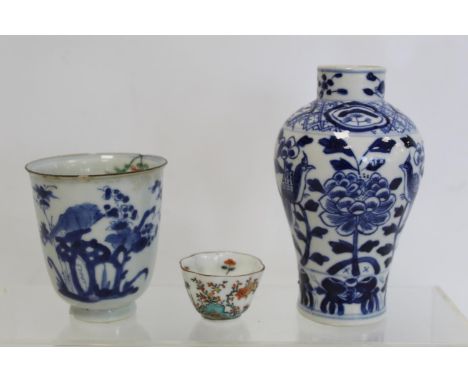 Antique Chinese blue and white porcelain wine cup decorated with rocks, flowers and bamboo, unmarked, 8cm high; a small blue 