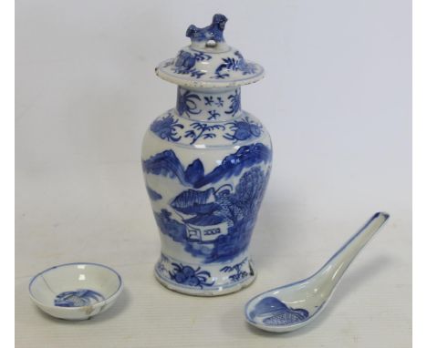 Small Chinese blue and white porcelain covered baluster vase decorated with cottages in a landscape with Dog of Fo finial and