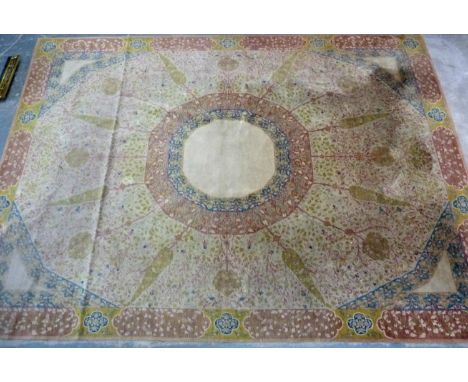 1930's English wool carpet in the Persian manner, the cream ground with central medallion, radiating trees and floral panel b