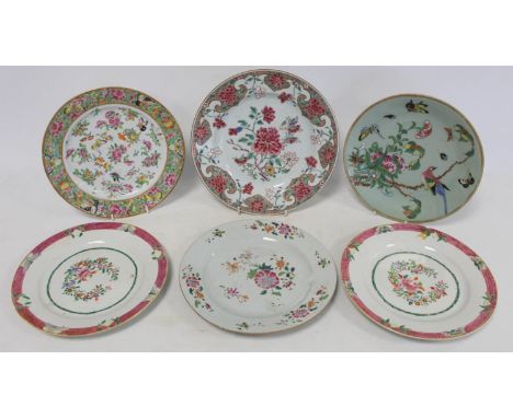 Four 18th century Chinese porcelain plates with floral decoration in the famille rose palette; a Canton plate decorated with 