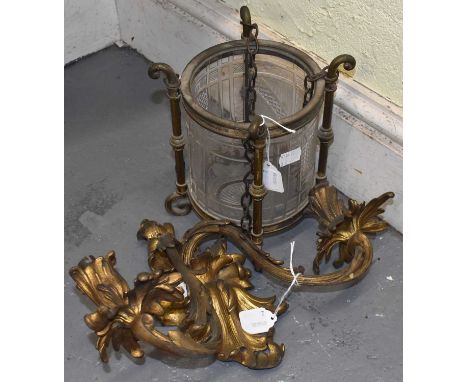 A gilt metal Rococo style two branch wall light, height 22cm, and a small circular brass framed hall lantern with cut glass s