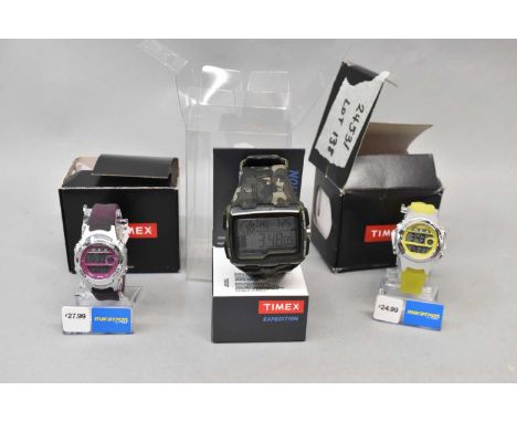 TIMEX; three wristwatches comprising a 'Marathon' with purple stars, a 'Marathon' digital alarm, and a gent's Expedition Grid