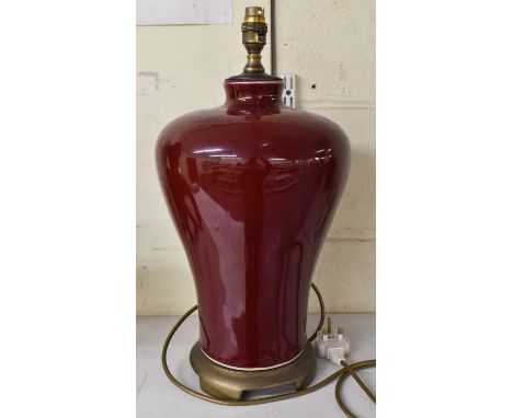  A large Chinese style sand de boeuf glazed lamp base, height to top of fitment approx 46cm, also a carved model of an elepha