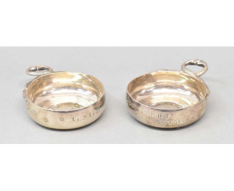 GOLF SOCIETY OF GREAT BRITAIN; a near pair of Elizabeth II hallmarked silver bowls with serpent handles, London 1961 and 1964