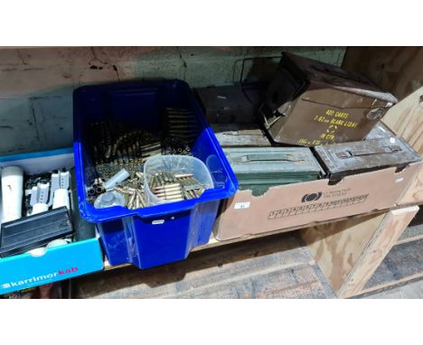 A box of ammo boxes, a large box of used bullets, mortar shells &amp; an empty gun magazine etc. 