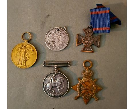 A collection of medals to include a WWI Victory medal marked 31708 A.W.O.CL.2 G. ROSS. C.N.Lan.R, a British war medal marked 