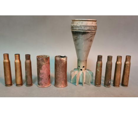 A collection of WW1 shells found in North East France together with a mortar casing. 