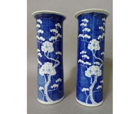 A pair of Chinese porcelain blue and white sleeve vases, each bearing four character Kangxi mark, height 26cm.Condition - one